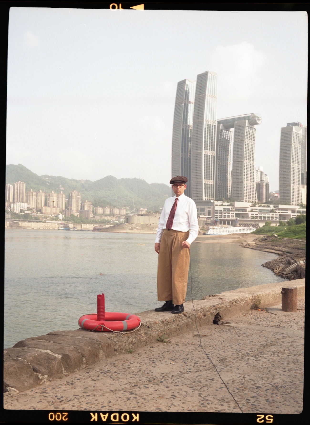 Thomas Ming-Hui Stanka, photography curator. Self portrait in Chongqing, China. 2025. Analog photography.